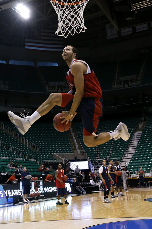 Chris Detrick  |  The Salt Lake Tribune
Arizona Wildcats guard Gabe York (1) dunks the ball during a practice at EnergySolutions Arena Wednesday March 20, 2013.