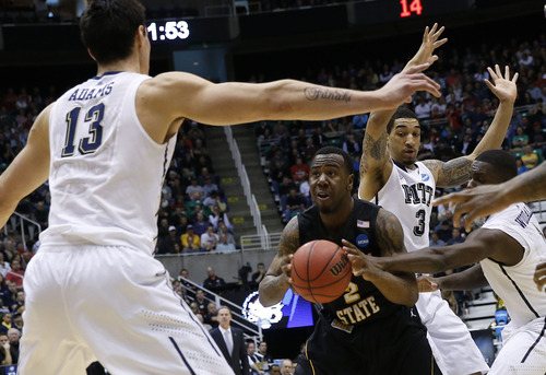 Chris Detrick  |  The Salt Lake Tribune

Wichita State Shockers guard Malcolm Armstead (2) tries to drive through the Pittsburgh defense as the Panthers face the Shockers in the NCAA tournament at EnergySolutions Arena on Thursday, March 21, 2013.
