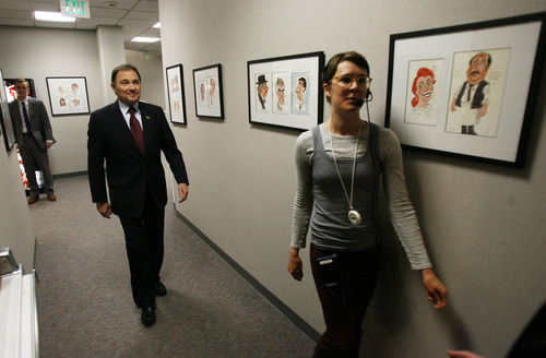 Francisco Kjolseth  |  Tribune file photo
Gov. Gary Herbert has vetoed HB76, the bill to allow Utahns to carry a concealed gun without a state-issued permit. In this file photo, he is led into the KUED studios by Production Assistant Ashley Swanson at the Eccles Broadcast Center on the University of Utah campus.