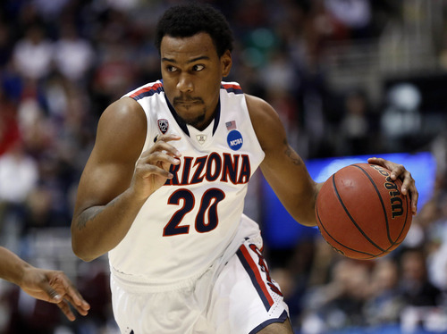 Trent Nelson  |  The Salt Lake Tribune

Arizona Wildcats guard Jordin Mayes (20) brings the ball down court as the Wildcats face the Crimson in the NCAA tournament at EnergySolutions Arena on Saturday, March 23, 2013.