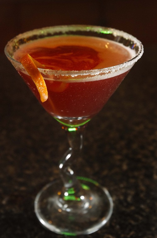 Leah Hogsten  |  The Salt Lake Tribune
Fat's Pool and Grill's Razzle Dazzle, which combines Kettle One vodka with coconut rum, raspberry liqueur and the juices of pineapple, cranberry and orange.