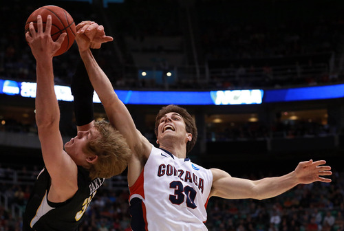 Scott Sommerdorf  |  The Salt Lake Tribune

Gonzaga Bulldogs guard Mike Hart (30) defends Wichita State Shockers guard Ron Baker (31) as the Bulldogs face the Shockers in the NCAA tournament at EnergySolutions Arena on Saturday, March 23, 2013.
