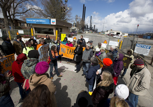 Lennie Mahler  |  The Salt Lake Tribune
A crowd of protesters gathers at the gate of the Chevron oil refinery in Salt Lake City, demanding an end to oil extraction from tar sands, citing damage to the environment, wildlife, and public health. Saturday, March 23, 2013.