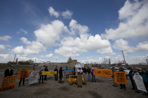 Lennie Mahler  |  The Salt Lake Tribune
Members of Utah Tar Sands Resistance and other environmental groups protest oil extraction from tar sands in front of the Chevron oil refinery north of downtown Salt Lake City, voicing concerns about damage to the environment, wildlife, and public health. Saturday, March 23, 2013.