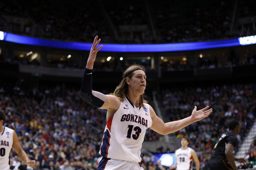 Trent Nelson  |  The Salt Lake Tribune

Gonzaga Bulldogs forward Kelly Olynyk (13) disputes a call as the Bulldogs face the Shockers in the NCAA tournament at EnergySolutions Arena on Saturday, March 23, 2013.