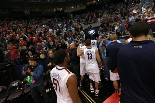Scott Sommerdorf  |  The Salt Lake Tribune

The Arizona Wildcats leave the court after beating the Harvard Crimson in the NCAA tournament at EnergySolutions Arena on Saturday, March 23, 2013.