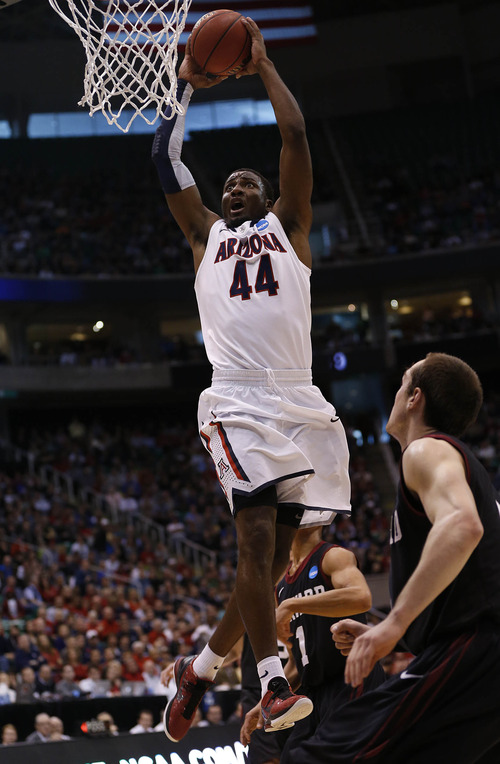 Trent Nelson  |  The Salt Lake Tribune

Arizona Wildcats forward Solomon Hill (44) goes up for a dunk as the Wildcats face the Crimson in the NCAA tournament at EnergySolutions Arena on Saturday, March 23, 2013.