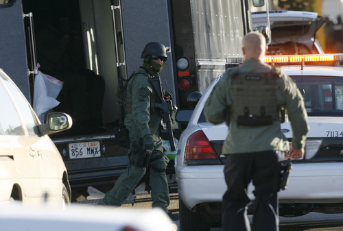 Francisco Kjolseth  |  The Salt Lake Tribune
West Valley City police evacuate a 2-3 block area surrounding 3150 S. Cantwell Street (2910 West), as they deal with a suspect who reportedly fired a gun during a standoff at a home.