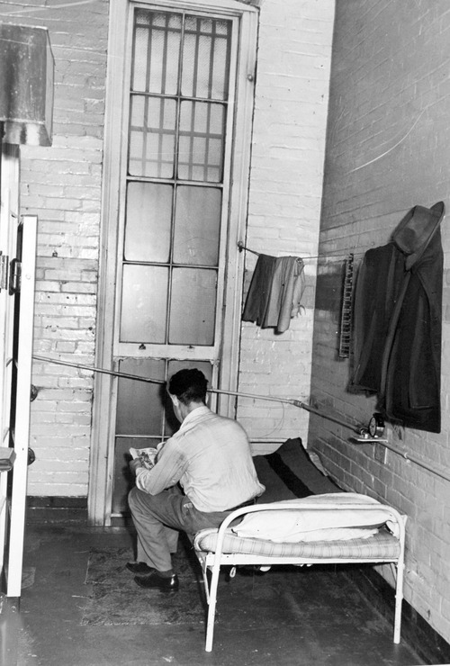 Tribune file photo

An inmate reads in his cell at the Utah State Prison in 1941. This was when the prison stood at what is now Sugar House Park.