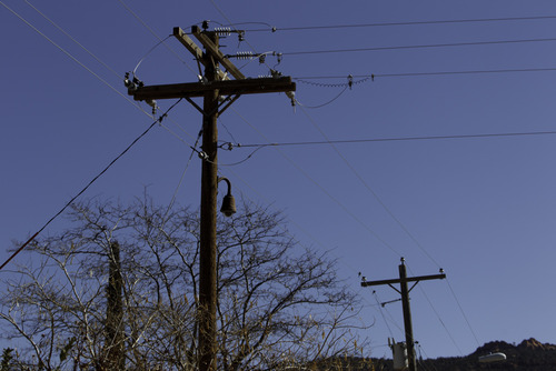 Trent Nelson  |  The Salt Lake Tribune
A surveillance camera mounted on what appears to be a public utility pole in Hildale, Utah. Monday, February 18, 2013.