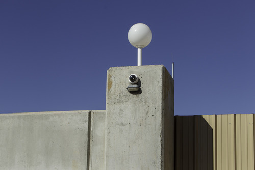 Trent Nelson  |  The Salt Lake Tribune
A surveillance camera mounted on the wall of a gated compound in Colorado City, Arizona. Monday, February 18, 2013.