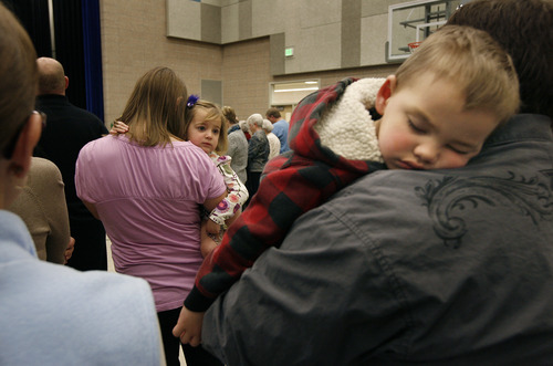 Scott Sommerdorf   |  The Salt Lake Tribune
Members of Clearfield Community Church attend Palm Sunday services at Wasatch Elementary School. Their church burned earlier this week.