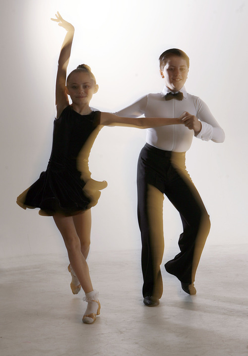 Francisco Kjolseth  |  The Salt Lake Tribune
Alex Murillo, owner of Centerstage dance school in Orem, has four kids designated as American representatives in an international ballroom dance competition in England which includes Carter Williams, 11, and Anika Baker, 10.