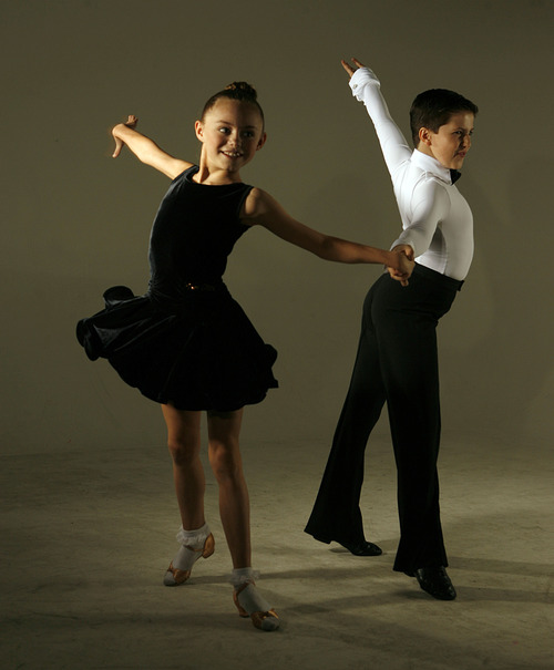 Francisco Kjolseth  |  The Salt Lake Tribune
Alex Murillo, owner of Centerstage dance school in Orem, has four kids designated as American representatives in an international ballroom dance competition in England which includes Carter Williams, 11, and Anika Baker, 10.