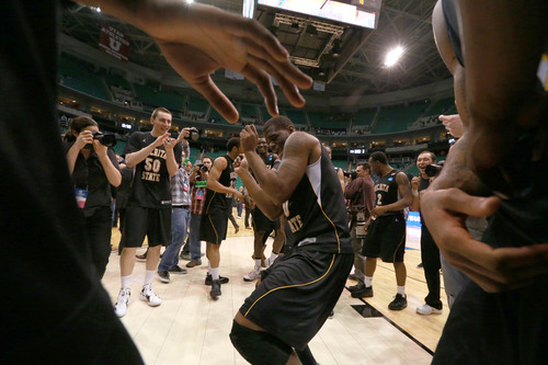 Scott Sommerdorf  |  The Salt Lake Tribune

Wichita State Shockers forward Chadrack Lufile (0) dances in celebration after beating Gonzaga in the NCAA tournament at EnergySolutions Arena on Saturday, March 23, 2013.