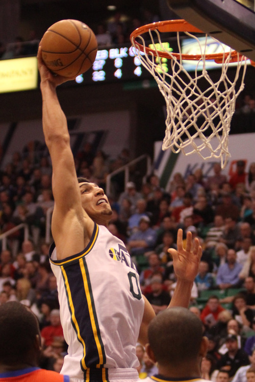 Rick Egan  | The Salt Lake Tribune 

Utah Jazz center Enes Kanter (0) gets a slam dunk, in NBA action, Jazz vs. the Sixers, at EnergySolutions Arena, Monday, March 25, 2013.