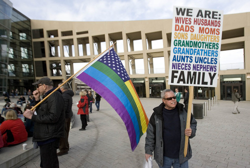 Paul Fraughton  |   Salt Lake Tribune
 As the US Supreme Court prepares to  deal with key cases involving same sex marriage, people gather at the amphitheater at Library Square for a vigil in support of gay marriage. 
 Monday, March 25, 2013