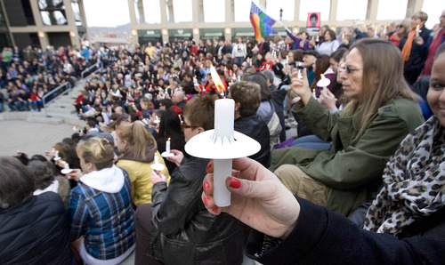 Paul Fraughton  |   Salt Lake Tribune
 As the US Supreme Court prepares to  deal with key cases involving same sex marriage, people gathered at the amphitheater at Library Square lift their  candles in support of same sex marriage. Monday, March 25, 2013