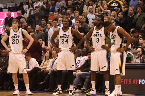 Rick Egan  | The Salt Lake Tribune 

Utah Jazz wait to take the floor during a  time out as they trail Boston in overtime, in NBA action at the EnergySolutions Arena,  Monday, February 25, 2013.