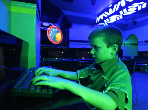 Rick Egan  | The Salt Lake Tribune 

Porter Johnson, 11, works the controls in the Columbia spaceship at the Discovery Space Center in Pleasant Grove, Tuesday, March 26, 2013.