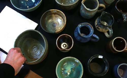 Leah Hogsten  |  The Salt Lake Tribune
In under two hours, the majority of wheel-thrown cups, bowls, plates, ceramic jewelry and other items created by Westminster ceramics students and ceramics professor, Kay Kuzminski were sold Wednesday, March 27, 2013 for charity in the Shaw Student Center. Kay Kuzminski, professor of art at Westminster College is retiring after 38 years of inspiring thousands of students to think creatively, both in and out of the art studio.