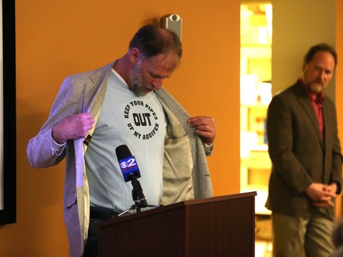 Paul Fraughton  |   Salt Lake Tribune
Steve Erickson of The Great Basin Water Network shows off a T-shirt expressing his views on the proposed  water sharing agreement between Utah and Nevada. He, along with other  representatives of  environmental organizations  spoke at  at a  rally  in opposition to the plan.Thursday, March 28, 2013