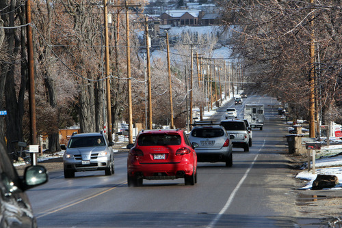 Francisco Kjolseth  |  The Salt Lake Tribune
Morning commuters make their way along 1300 East, between Pioneer Road and 13200 South on Thursday, March 21, 2013. Draper city is studying a road-widening project along that stretch and plans to have an open house to discuss the project on April 11.