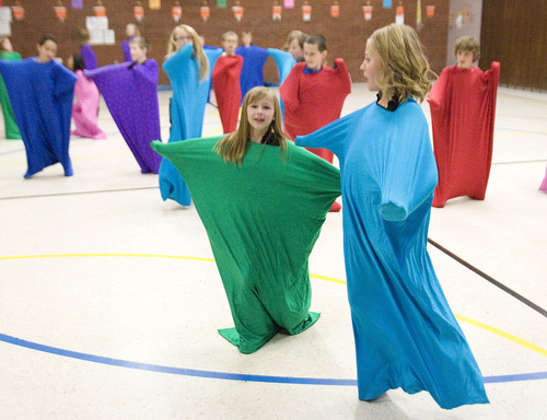 Paul Fraughton  |  The Salt Lake Tribune
A fourth-grade class at Welby Elementary School in South Jordan puts on costumes as part of a lesson on patterns and shapes using their bodies. The class, taught by instructor Angela Challis, is funded from The Beverley Taylor Sorenson Arts Learning Program that received $4 million in the state budget for 2013-2014.
 Wednesday, March 20, 2013