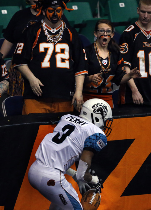 Scott Sommerdorf   |  The Salt Lake Tribune
A Blaze fan reacts to a fumbled kickoof by Rattlers return man Jaren Perry during first half play. The Blaze were down 33-28 at the half in their Arena League home opener against the Arizona Rattlers, Friday, March 29, 2013.