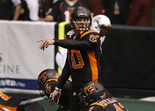Scott Sommerdorf   |  The Salt Lake Tribune
Blaze QB Tommy Grady directs the offense during first half play. The Blaze were down 33-28 at the half in their Arena League home opener against the Arizona Rattlers, Friday, March 29, 2013.