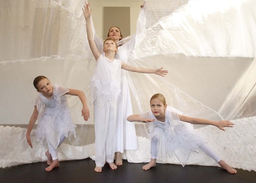 Leah Hogsten  |  The Salt Lake Tribune
Chara Huckins-Malaret plays the snow queen with Elijah Cook, 9, Abbigal Wright, 10 and Emelia Nelson, 9, of the Children's Dance Theatre rehearses for the upcoming production of The Snow Queen at the George Thomas Building on the University of Utah campus,Thursday, March 22, 2013.