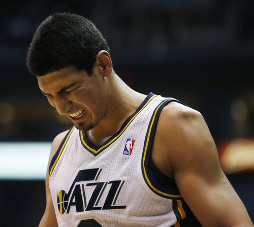 Steve Griffin | The Salt Lake Tribune


Utah's Enes Kanter winces as he leaves the court with a dislocated left shuolder during first half action in the Jazz versus Suns NBA game at EnergySolutions Arena in Salt Lake City, Utah Wednesday March 27, 2013. Kanter dislocated his shoulder diving for a loose ball.