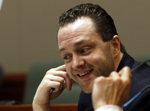 Rick Egan  | The Salt Lake Tribune 

Nathan Sloop laughs at a joke during his preliminary hearing at 2nd District Court in Farmington, Thursday, March 28, 2013. Sloop is charged with the May 2010 death of his stepson, 4-year-old Ethan Stacy.