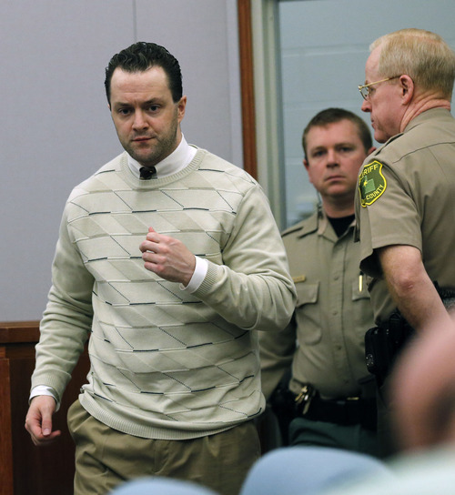Al Hartmann  |  The Salt Lake Tribune
Nathan Sloop, charged with the May 2010 death of his stepson, 4-year-old Ethan Stacy enters 2nd District Court in Farmington for preliminary trial Friday March 29.