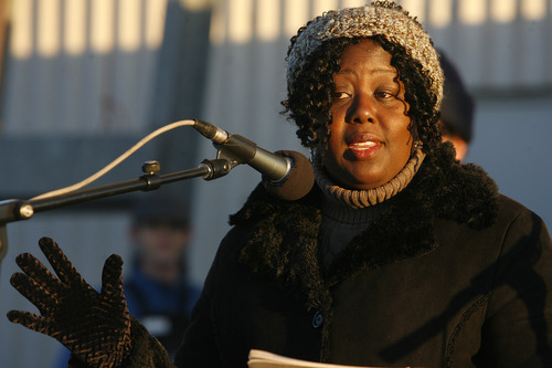 Scott Sommerdorf   |  The Salt Lake Tribune
The Rev. Denise Elbert of New Pilgrim Baptist Church preaches at Easter sunrise service at on Hidden Peak, Sunday, March 31, 2013. "[Uniting] us here out on this mountaintop I believe it is the splendor of the sunrise service and celebration of a resurrected savior," she told the crowd.