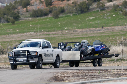 Chris Detrick  |  The Salt Lake Tribune
Troy Knapp is driven to the Sanpete County Sheriff's Office Tuesday April 2, 2013. The 45-year-old wilderness survivalist had frustrated law enforcement for more than five years as he continued to elude capture before surprising the group of antler hunters, who reported the sighting to police.