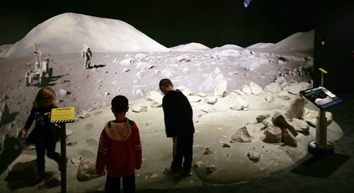 Steve Griffin | The Salt Lake Tribune


Children walk on the moon at the Clark Planetarium at The Gateway in Salt Lake City, Utah Tuesday March 26, 2013.