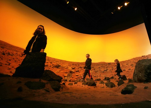 Steve Griffin | The Salt Lake Tribune


Patrons enjoy a stroll on Mars at the Clark Planetarium at The Gateway in Salt Lake City, Utah Tuesday March 26, 2013.