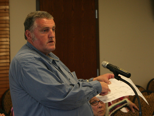 Steve Griffin | The Salt Lake Tribune


Brooks Baker, who was representing the Corporation of the Presiding Elder of the Apostolic United Brethren, talks during a Bluffdale Planning Commission public hearing on a request by the group to rezone about 26 1/2 acres from agricultural to high-density residential. The hearing was held in Bluffdale, Utah Tuesday April 2, 2013.