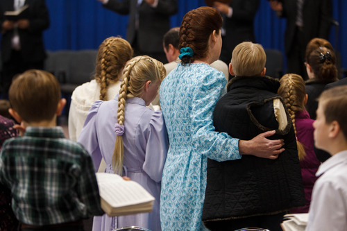 Trent Nelson  |  The Salt Lake Tribune
Worshippers sing a hymn during a church service of  FLDS members Sunday, Feb. 17, 2013 in Hildale. The group meeting in the Holm School no longer follows Warren Jeffs.