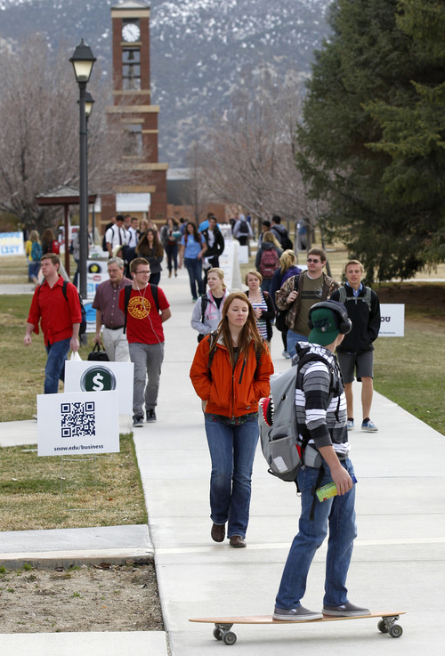 Al Hartmann  |  The Salt Lake Tribune
Students head to class through the commons area at Snow College in Ephraim.  The predominantly Mormon school will be particularly hard-hit by the lowered missionary age which will affect enrollment.