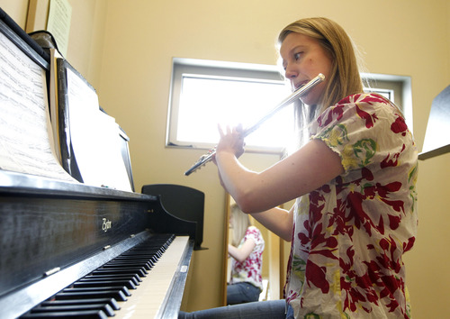 Al Hartmann  |  The Salt Lake Tribune
Mellaina Adams, 20, a sophomore in music practices flute in a sound proof booth in the performing arts building at Snow College.   She will be going on a Mormon mission to Montreal.  The predominantly Mormon school will be particularly hard-hit by the lowered missionary age which will affect enrollment.