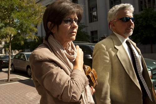 Jeanne Redd and defense attorney Mark Moffat walk away from the Federal Courthouse Wednesday September 16, 2009.  The mother and daughter duo from Blanding avoided prison time when they were sentenced in federal court Wednesday for illegally trafficking in American Indian artifacts. Federal Judge Clark Waddoups sentenced Jeanne Redd to 36 months of probation. Her daughter, Jericca Redd, received 24 months of probation and a $300 fine.

Photo by Chris Detrick/The Salt Lake Tribune