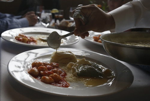 Rick Egan  | The Salt Lake Tribune 

Pasta is dished up at table side, at Valter's Osteria restaurant, on 300 South in Salt Lake City, Wednesday, March 27, 2013.