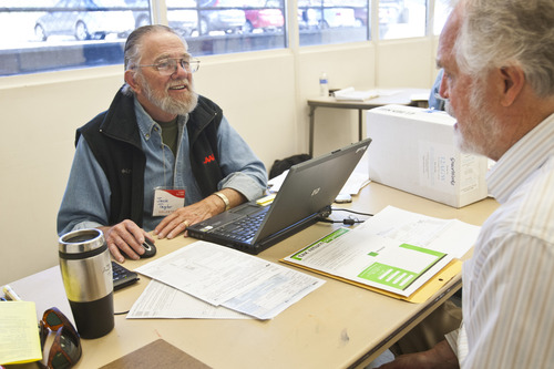Chris Detrick  |  The Salt Lake Tribune
AARP volunteer Jack Taylor helps Allen Muse with his taxes at the Salt Lake Tenth East Senior Center Wednesday April 3, 2013.