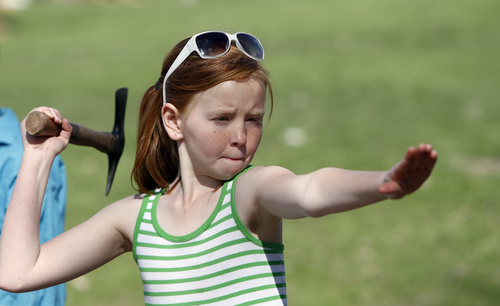 Rick Egan  | The Salt Lake Tribune 

10-year-old Allison Price, throws the tomahawk throw at the Fort Buenaventura Easter Rendezvous in Ogden, Saturday, March 30, 2013. Allison has been thrown the tomahawk since she was 3 years old.