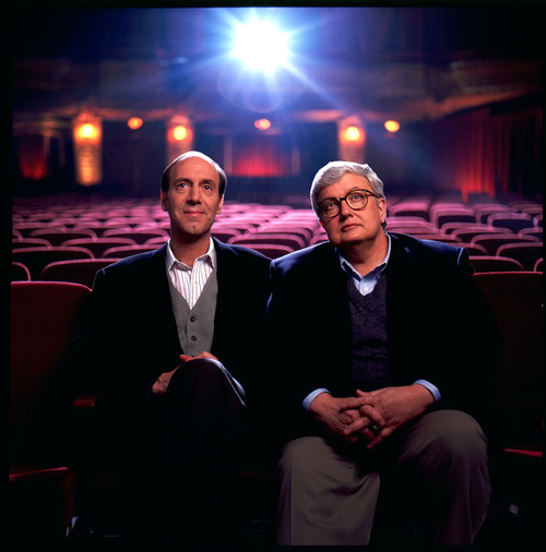 FILE - This undated file photo originally released by Disney-ABC Domestic Television, shows movie critics Roger Ebert, right, and Gene Siskel. The Chicago Sun-Times is reporting that its film critic Roger Ebert died on Thursday, April 4, 2013. He was 70. Ebert and Siskel, who died in 1999, trademarked the "two thumbs up" phrase.   (AP Photo/Disney-ABC Domestic Television)