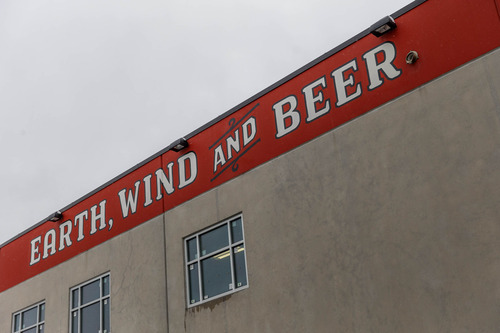 Trent Nelson  |  The Salt Lake Tribune
"Earth, Wind and Beer" painted on the building at Uinta Brewing Company, Friday March 22, 2013 in Salt Lake City.