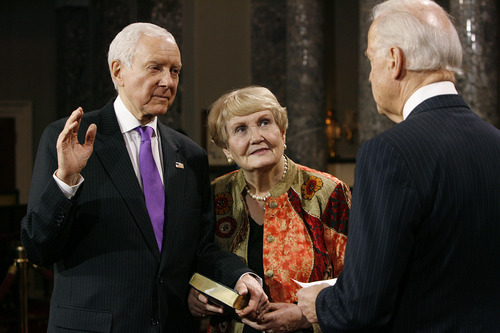 Scott Sommerdorf   |  Tribune file photo
Sen. Orrin Hatch, R-Utah, says he sees civil unions as a way to protect 'traditional marriage' from the push for legalizing gay marriage. In this photo from January, he is accompanied by his wife, Elaine, as he is sworn into a seventh term by Vice President Joe Biden.