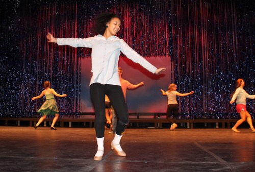 Rinna Waddhany | Special to The Tribune
Olympus High School students rehearse for "Singing in the Rain," the last performance that will take place on the school's stage before the new Olympus High School opens this spring.